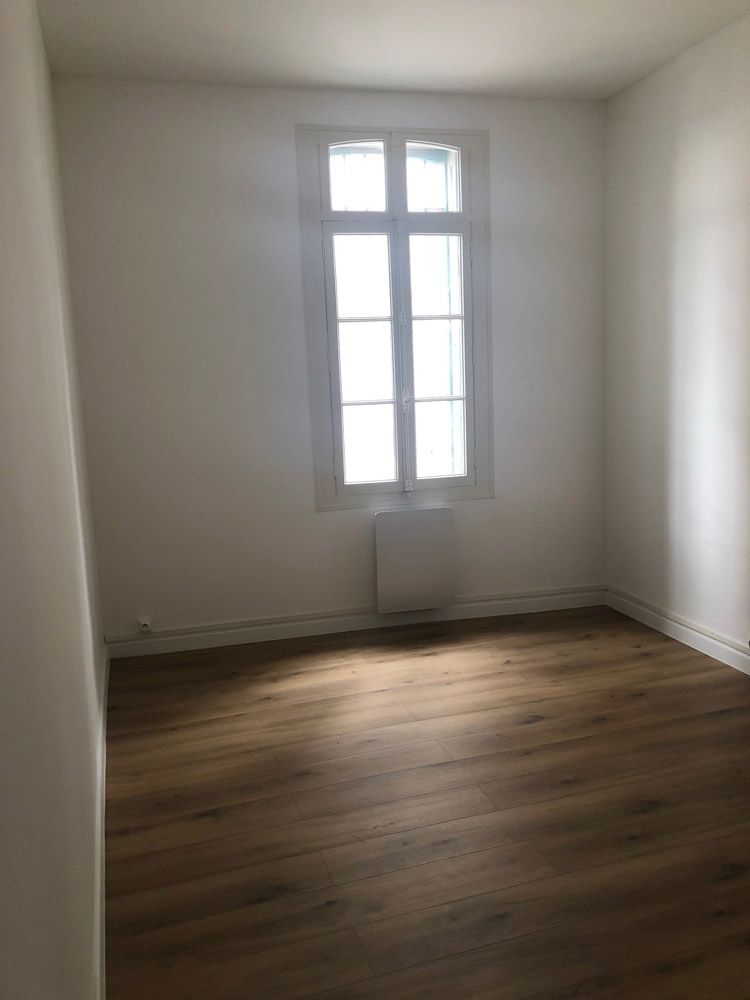 chambre rénovée | immeuble de rapport